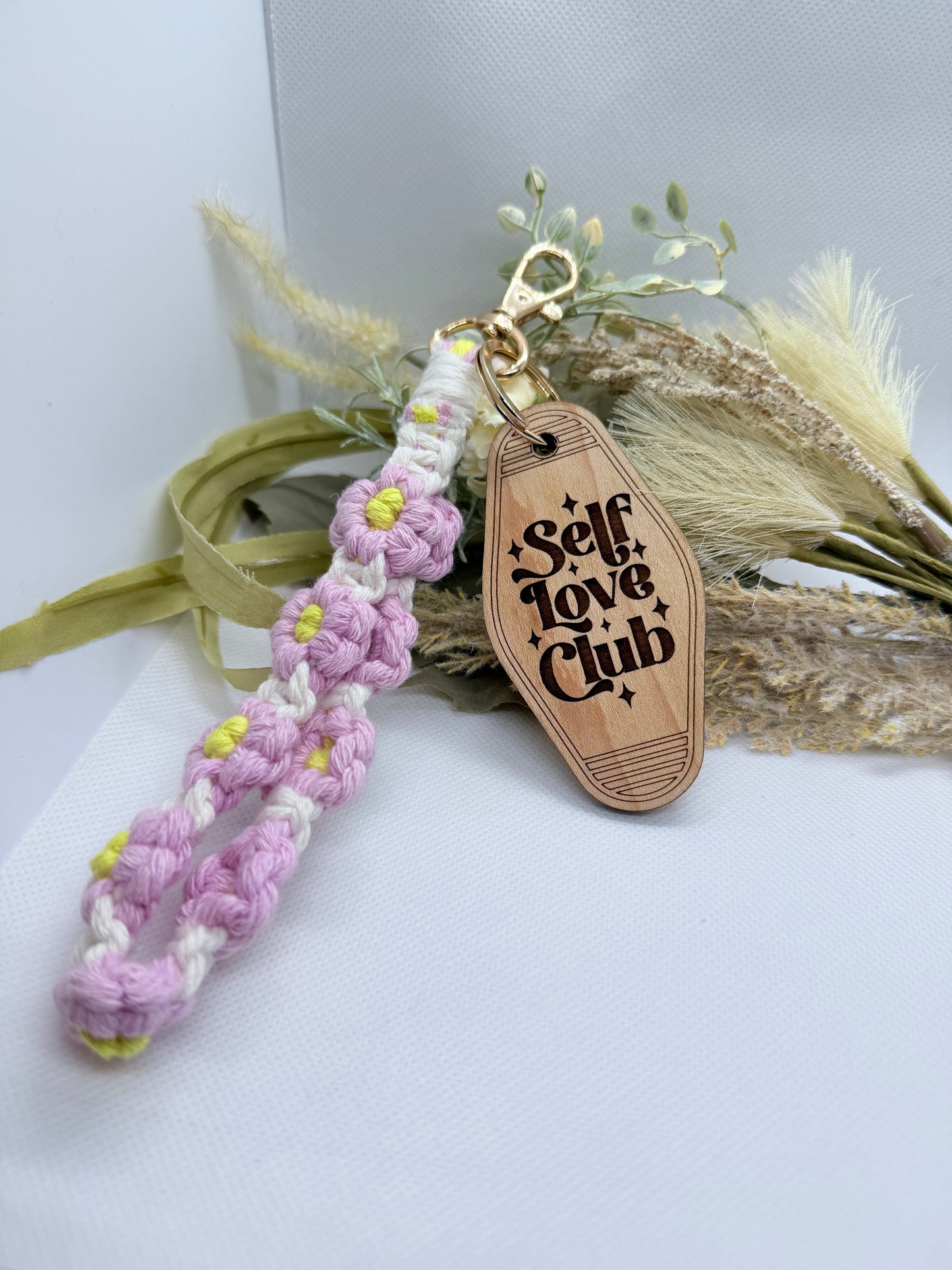 Wristlet motel keychain